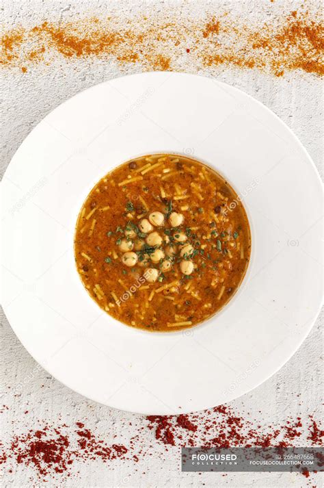 Traditional Harira Soup For Ramadan In Plate On White Tabletop With