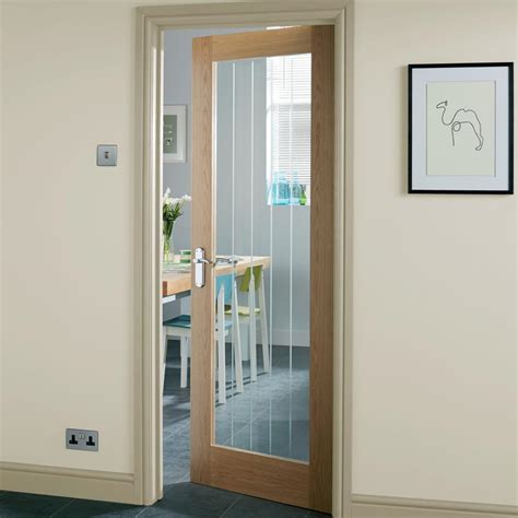 Howdens Genoa Oak Clear Glazed Door | Howdens