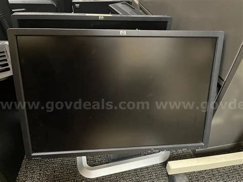 Lot of Four (4) HP 2275w Monitors | AllSurplus