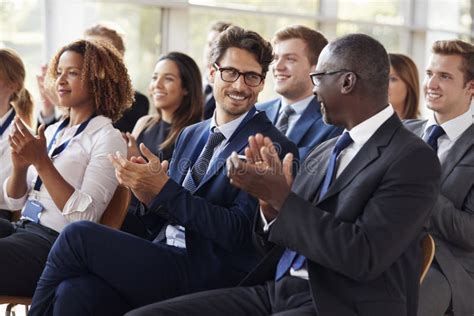 Audience Clapping Hands After Business Seminar At Loft Stock Image