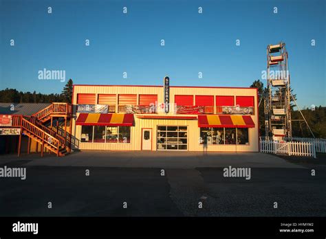 A Roadside Attraction With A Classic Studebaker Car Garage And A Small