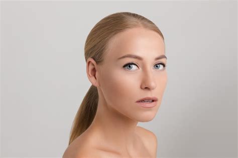 Premium Photo Beautiful Blonde Caucasian Woman Over White Wall