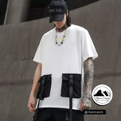 🥇CAMISETA OVERSIZE BOLSILLOS NEGROS - RIVER CAVES