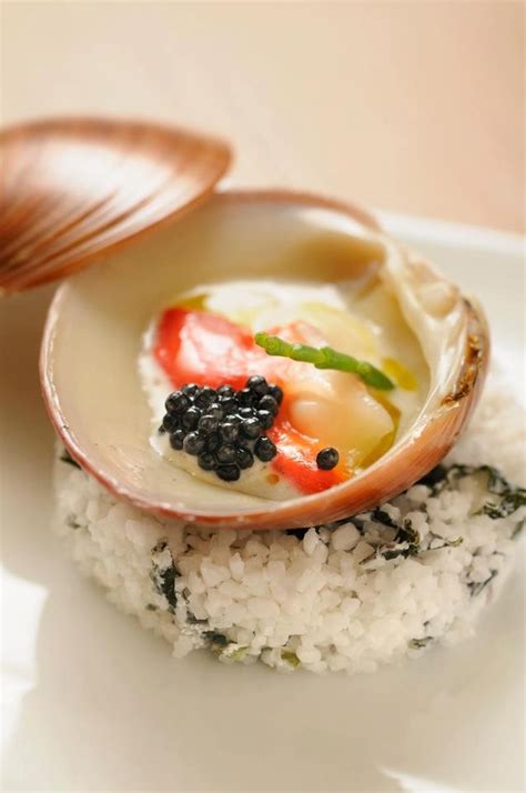 A White Plate Topped With Rice And Fruit