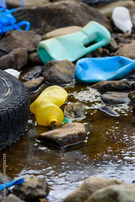 Dirty water with plastic pollution Stock Photo | Adobe Stock