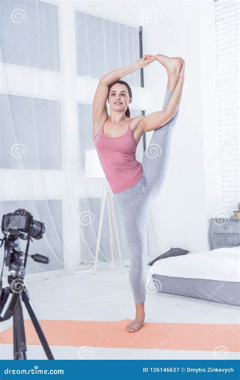 Delighted Nice Woman Holding Her Leg Up Stock Image Image Of Hobby Healthy 126146637