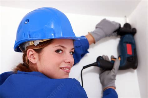 Woman With Electric Drill Photo Background And Picture For Free