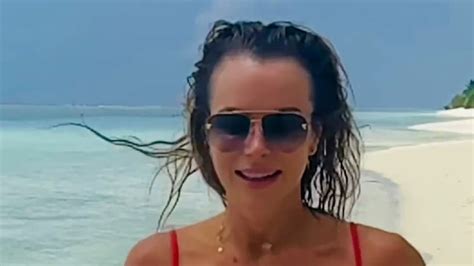 Amanda Holden Flaunts Her Jaw Dropping Figure In A TINY Red Bikini