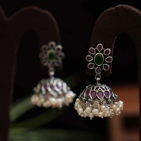 bhadran silver jhumka earrings