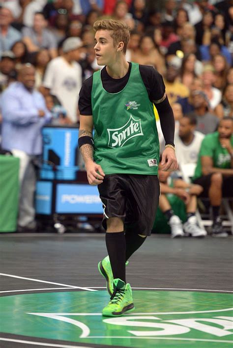 Singer Justin Bieber attends the Sprite Celebrity Basketball Game ...