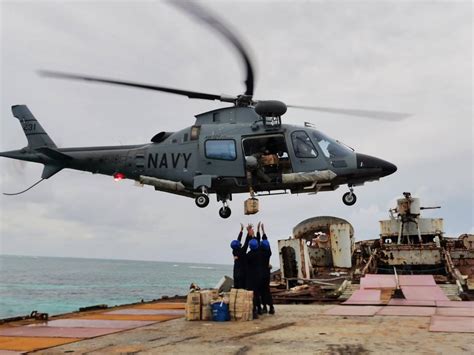 LOOK: PH Navy sends Christmas cheer to West Philippine Sea islands ...