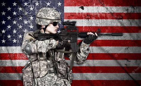 Premium Photo Soldier Holding Rifle