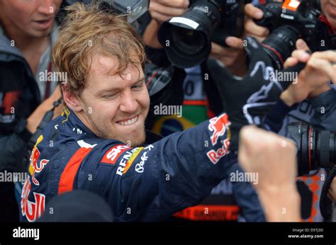 German Formula One Driver Sebastian Vettel Of Red Bull Celebrates His