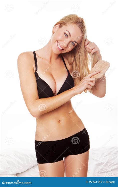 Blonde Woman Brushing Hair Stock Image Image Of Inside