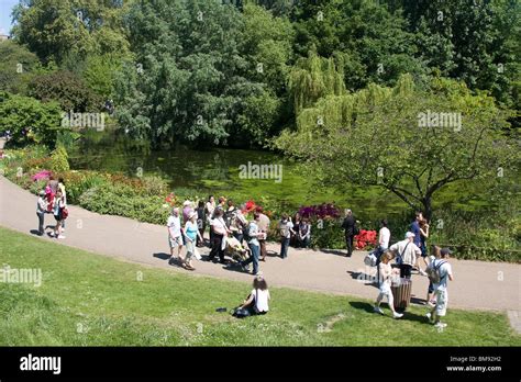 Visitors Walking Path Grass Flowers Trees Green Stock Photo Alamy