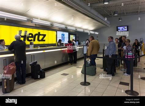 Hertz car hire counter, JFK airport, New York, USA Stock Photo ...