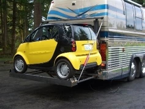 Busforsale.com: Prevost/ Smartcar lift??