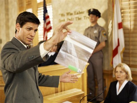 Male Lawyer Displaying Evidence To Jury Trial Theater Secrets For