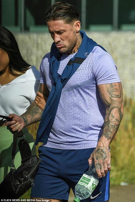 Sex Offender Stephen Bear Puts On Loved Up Display With His Brazilian Girlfriend As They Head To