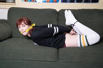 Horny Red Haired Whore Enjoys Bondage Session Photos