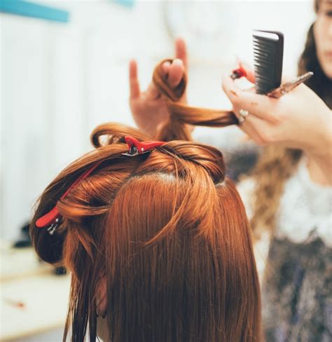 Premium Photo Stylist Working In The Beauty Salon Haircut And Hair