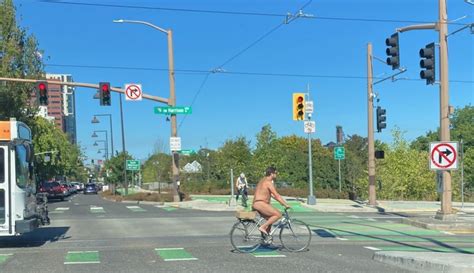 Bright Sun Full Moon Naked Bike Riders Roll Through Portland