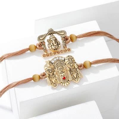 Buy Send Lord Ganesha And Lord Jagannath Rakhi Set Of 2 Online IGP