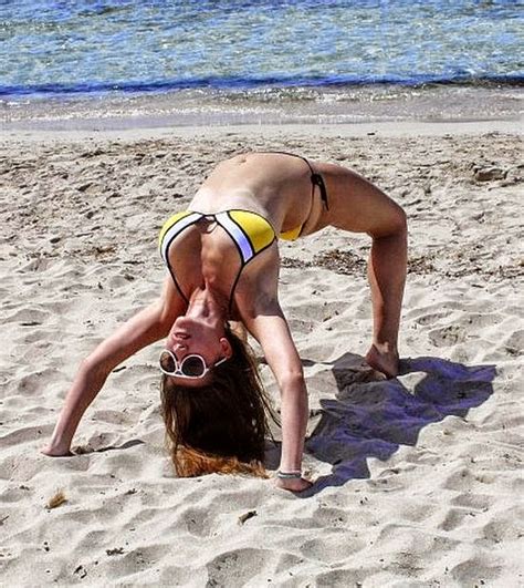 Retro Bikini Imogen Thomas Catches Some Rays In A White Bikini With