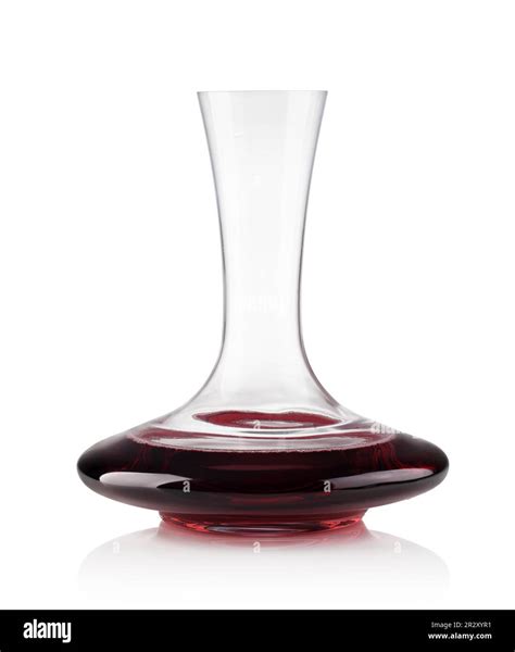 Red wine on a decanter isolated over white background Stock Photo - Alamy