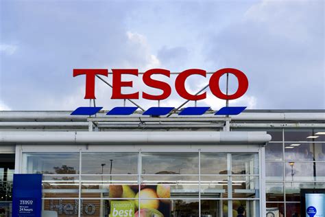 tesco launches give  store  partnership  trussell trust