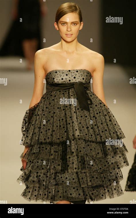 Givenchy Paris Ready To Wear Autumn Winter Model Brunette Hair Off Face Wearing Strapless Grey