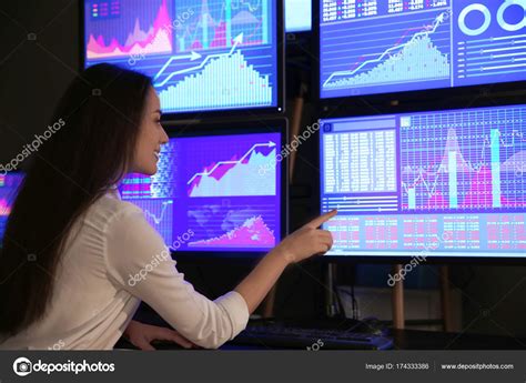Female stock trader in office — Stock Photo © belchonock #174333386