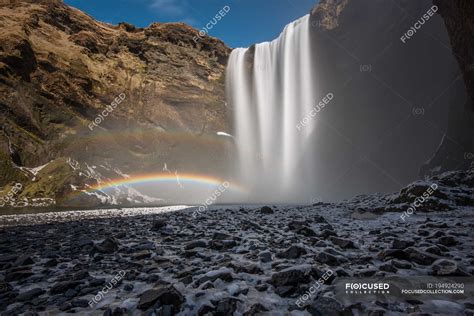 Skogafoss waterfall with double rainbow, Iceland — scenic view, trip ...