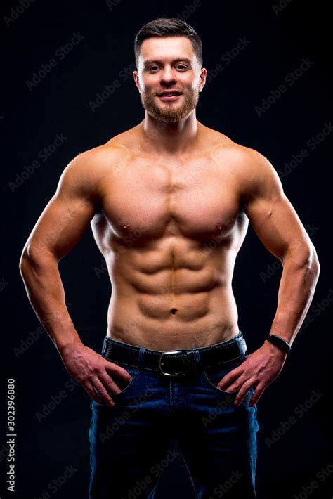 Muscular Guy With Naked Torso Posing With Hands On Waist Studio Photo Portrait Of A Handsome