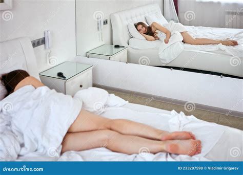 Rear View Of Naked Slender Woman Who Lies In Bed Stock Photo Image Of Female Inside