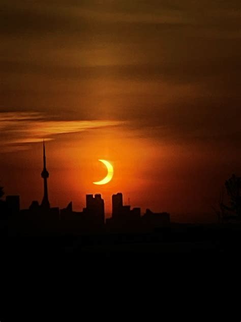 Partial Eclipse Over Downtown From This Morning Scrolller