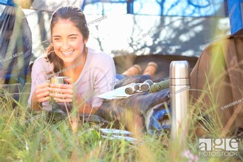 Smiling Brunette Camper Lying In Tent Stock Photo Picture And Low Budget Royalty Free Image