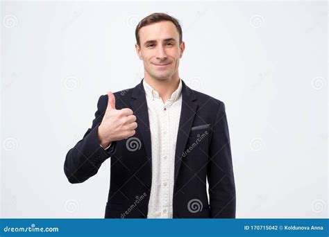 Happy Mature Italian Man In Suit With Thumbs Up Gesture Approving Your Choice Stock Photo