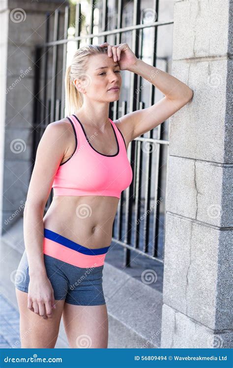 A Pretty Woman Leaning Against A Pillar Stock Photo Image Of