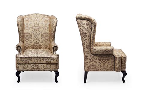 Кресло с ушами в ткани с вензелями