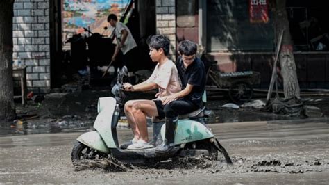 Beijing's flooding death toll rises to 33, with 18 still missing | CBC News