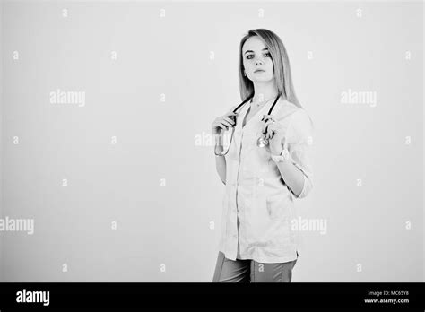 Blonde Doctor Nurse With Stethoscope Isolated On White Background Stock Photo Alamy