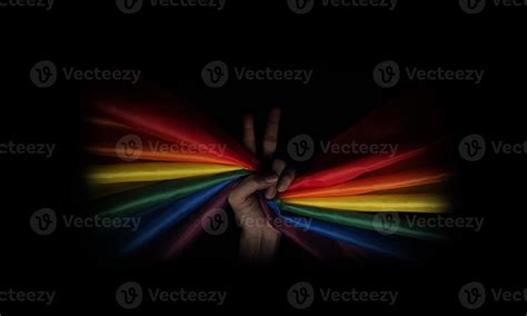 Lgbtq Pride Flag On Black Background Lgbt Rainbow Flag In Gay Hand Stock Photo At