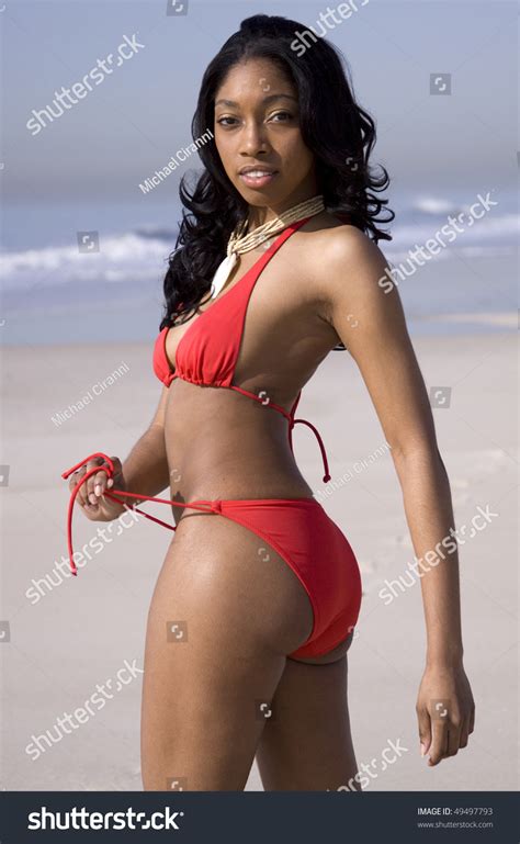African American Woman Red Bikini Posing Stock Photo 49497793