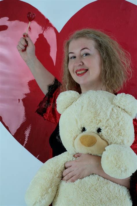 An Older Pretty Blonde Curly Woman Stock Photo Image Of Confidence Horizontal