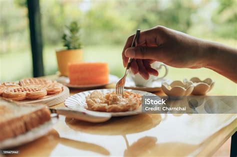hand  fork pick piece  fresh roti  plate roti  dessert