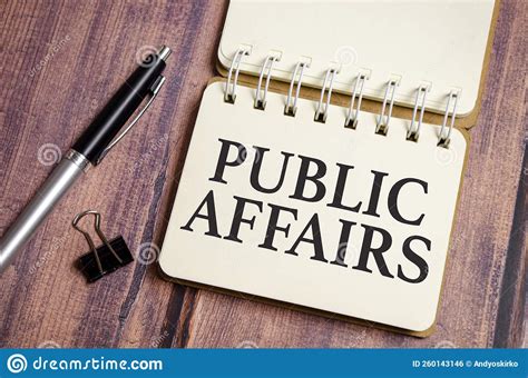 Public Affairs Words On Notebook And Wooden Background Stock Photo