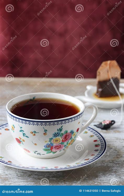 A Cup Of Tea And Tea Bag On A Table Stock Photo Image Of Beverage