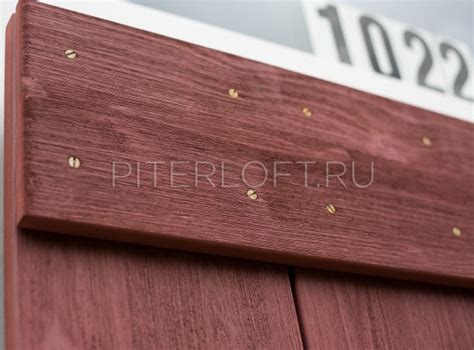 Амбарная дверь на кованых роликах купить в Санкт-Петербурге