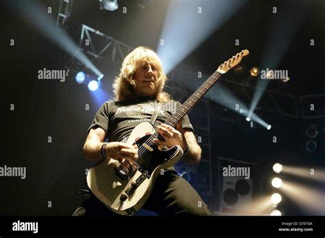 Guitarists Rick Parfitt Rock Group Status Quo On Stage Hi Res Stock